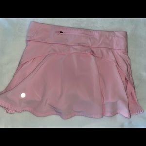 Lululemon Play Off The Pleats Mid-Rise Skirt in light pink